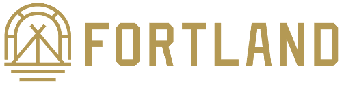 Logo of Fortland featuring a stylized design with an arch, crossed tools, and the brand name in gold.